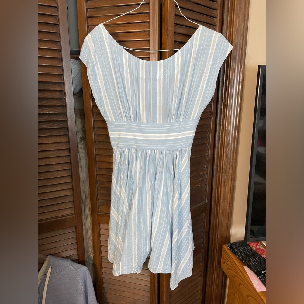Super cute cotton dress from anthropology. Cute back detailing, drapes well